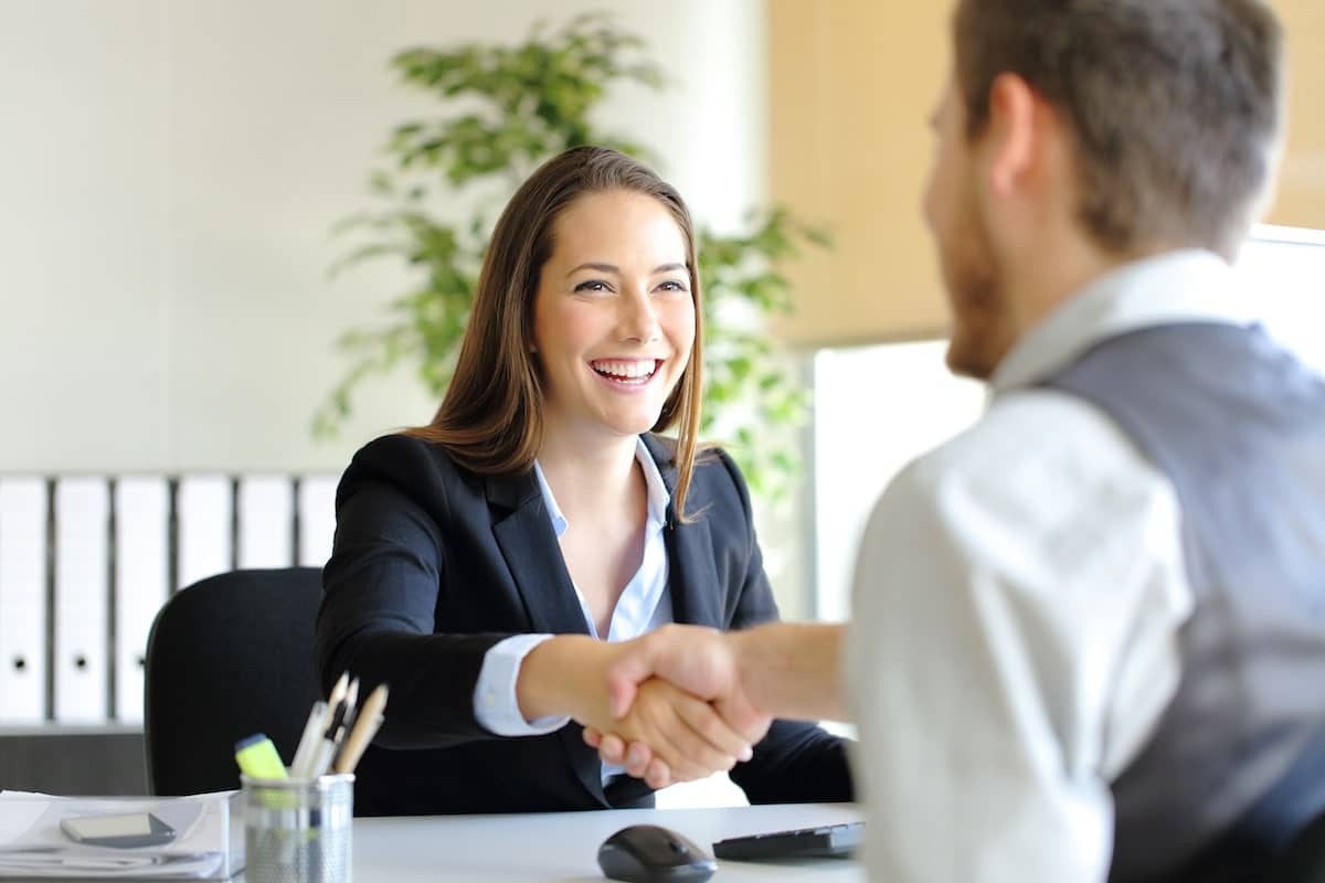Shake hands between employer and employee